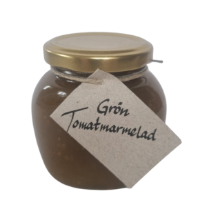 Burk med grön tomatmarmelad från Fristorps gård med naturlig färg och innehåll.