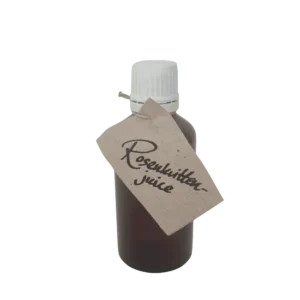 Flaska med rosenkvittenjuice från Fristorps gård i liten glasflaska.