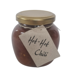 Burk med hot hot chili från Fristorps gård, en chiliröra med tydlig färg och konsistens.